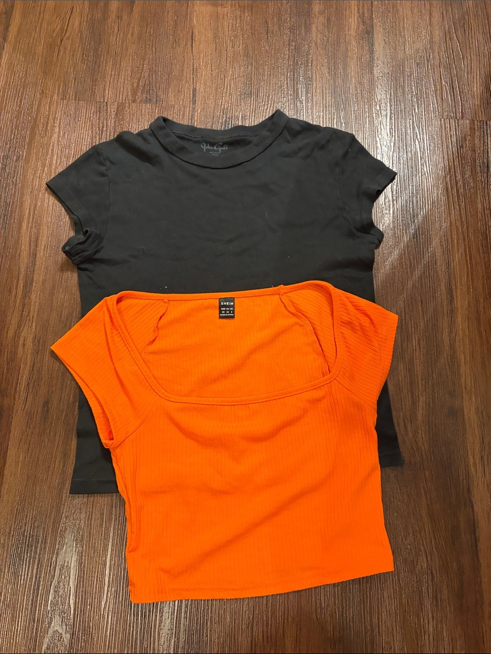 Mixed lot two women’s tops orange & black size 2 t-shirt. SHEIN John Galt